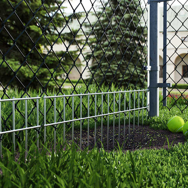 Bottom fence outlet barrier